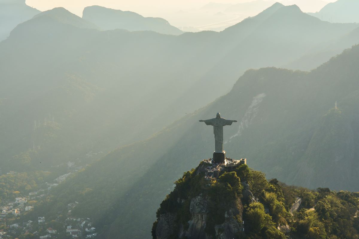 Christ the Redeemer Statue overlooking the Brazilian landscape. Photo by Raphael Nogueira on Unsplash.